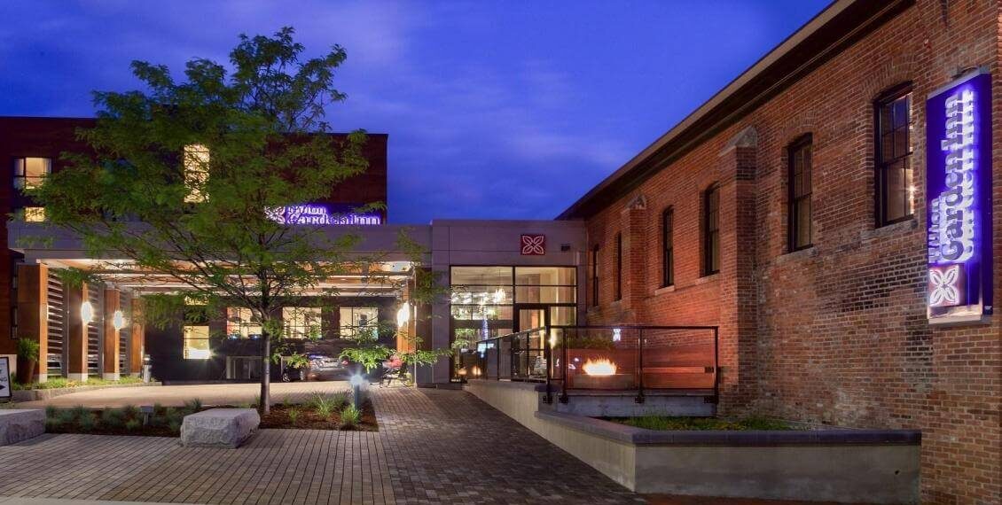 brick L shape building at night