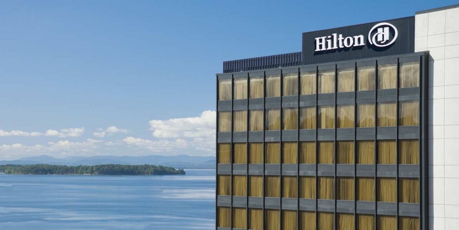 tall Hilton bldg. with lake champlain in background