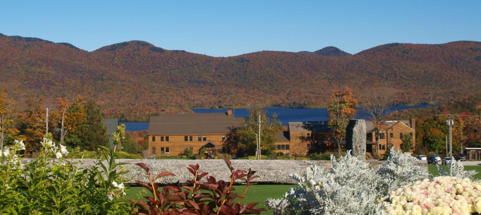 large brown building before a mountain