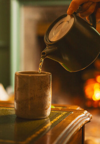 A cup of tea by the fireplace